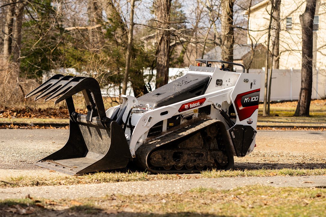 Crane-assisted tree removal by Pro-Stump Tree Service, 40-ton Terex Stinger